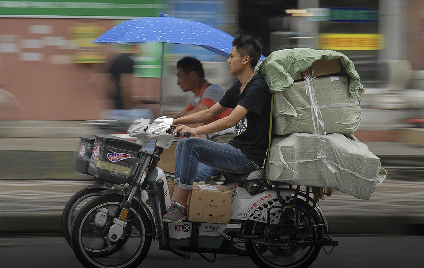 'Tuổi trẻ trôi dạt' của các giao hàng trẻ làm 10 tiếng ngày ở Trung Quốc 1